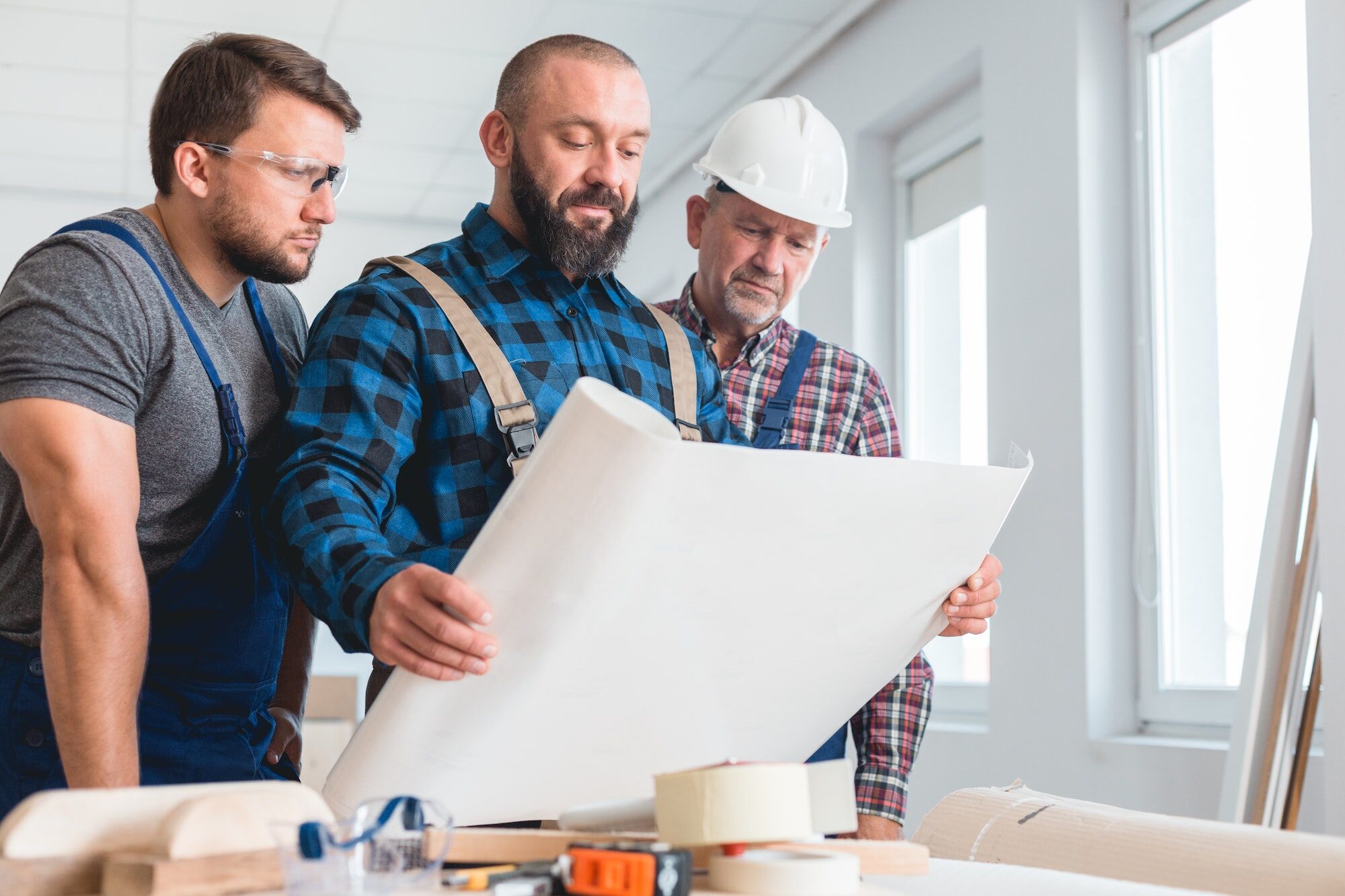 Builders looking at the blueprint